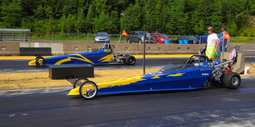 Jacey Pozzebon, left, and her brother Gavin Pozzebon are shown lined up for a race at Cape Breton Dragway in Sydney. The brother-sister duo will be on the track this weekend, competing in the junior dragsters' division. PHOTO CONTRIBUTED/GERARD BRYDEN