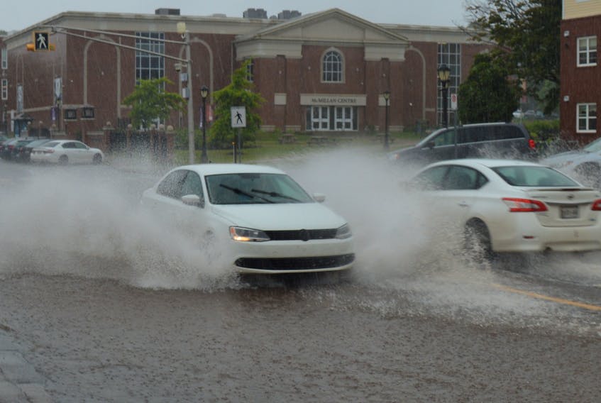 In heavy rain, Grafton Street, adjacent to the Glendenning Hall student residence at Holland College, can turn into a swimming pool for motorists. Things were no different on Sept. 2.