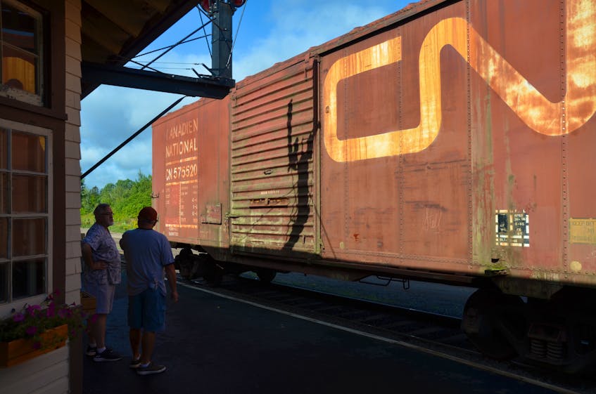 Thanks to a crew from A.W. Leil Cranes and a team of volunteers, a boxcar gifted by the County of Annapolis now sits on the tracks outside the Middleton Railway Museum. CONTRIBUTED