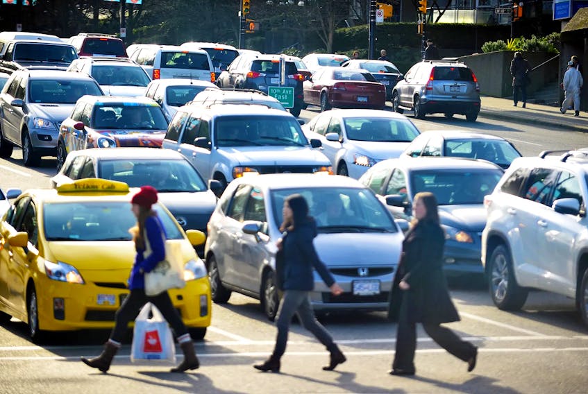 Traffic and people congestion clogs the intersection of West Broadway and Cambie in Vancouver in this 2015 file photo. Wayne Leidenfrost/Postmedia News file