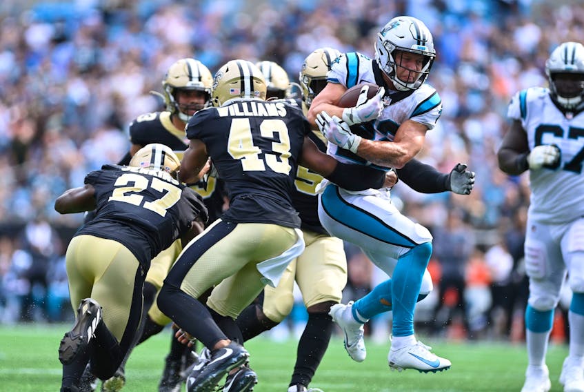 Carolina Panthers running back Christian McCaffrey breaks free for a touchdown as New Orleans Saints strong safety Malcolm Jenkins (27) and free safety Marcus Williams (43) defend in the fourth quarter at Bank of America Stadium. (Bob Donnan/USA TODAY Sports)