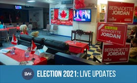 A small crowd of Bernadette Jordan supporters gathers at the Bridgewater Curling Club to watch the federal election results roll in on Monday, Sept. 20, 2021.