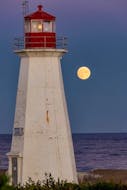 t wasn't quite full, but it was spectacular.  Barry Burgess snapped this stunning photo of the Harvest Moon Sunday evening at moonrise, near Western Head, N.S.