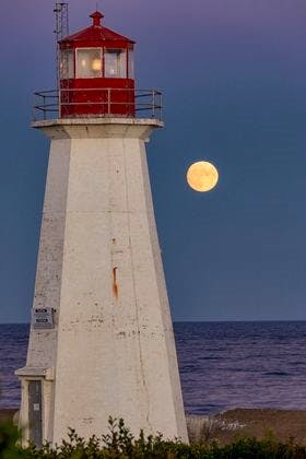 t wasn't quite full, but it was spectacular.  Barry Burgess snapped this stunning photo of the Harvest Moon Sunday evening at moonrise, near Western Head, N.S.