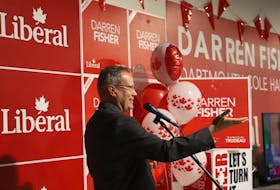 Liberal incumbent Darren Fisher speaks and celebrates with his supporters after taking Dartmouth-Cole Harbour on Monday, Sept. 20, 2021.