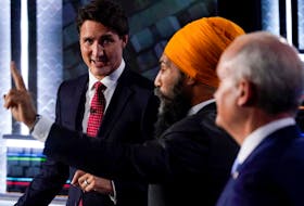 Liberal Leader Justin Trudeau, left to right, NDP Leader Jagmeet Singh, and Conservative Leader Erin O'Toole take part in the federal election English-language Leaders debate in Gatineau September 9, 2021.  Adrian Wyld/Pool via REUTERS