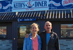 Jonelle Feaver grew up in the Goulds and is a huge fan of Keith’s Diner, a family owned restaurant which has been open in the area since 1963. She’s such a fan, her mother used to bring an order when she would fly to visit her in Toronto, where she now lives. Although she’s already had it three times since landing in the province for a visit last Thursday, she plans on having it the day before she leaves as well. Next to her is Keith Ward, who was the owner/operator since 1989. Now that he’s retiring, his daughter, Mallory, is the owner/operator.