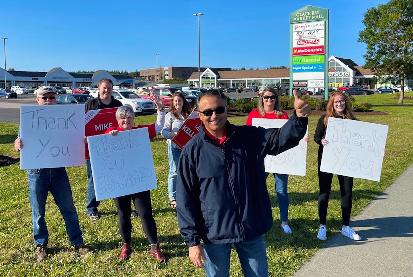 Cape Breton-Canso Liberal MP Mike Kelloway is all smiles on Tuesday in Glace Bay, along with his supporters Dennis Shea, from left, John Patrick Fitzgerald, Liz Healy, Timika Boudreau, Meghan Mombourquette and Elizabeth Arsenault. CONTRIBUTED