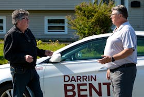 Conception Bay South mayoral candidate Darrin Bent (right) speaks with Duke Tobin while out campaigning in the town Tuesday.

Keith Gosse/The Telegram