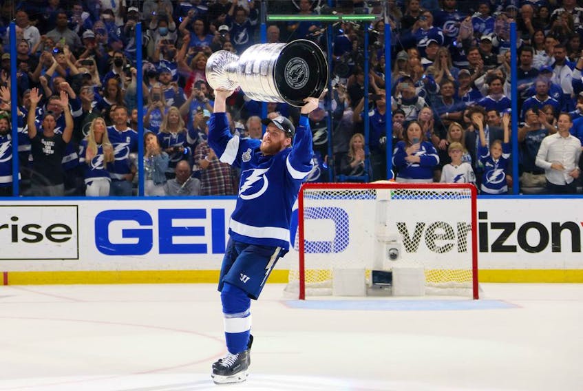 Blake Coleman #20 of the Tampa Bay Lightning celebrates with the Stanley Cup after the 1-0 victory against the Montreal Canadiens in Game Five to win the 2021 NHL Stanley Cup Final at Amalie Arena on July 07, 2021 in Tampa, Florida.