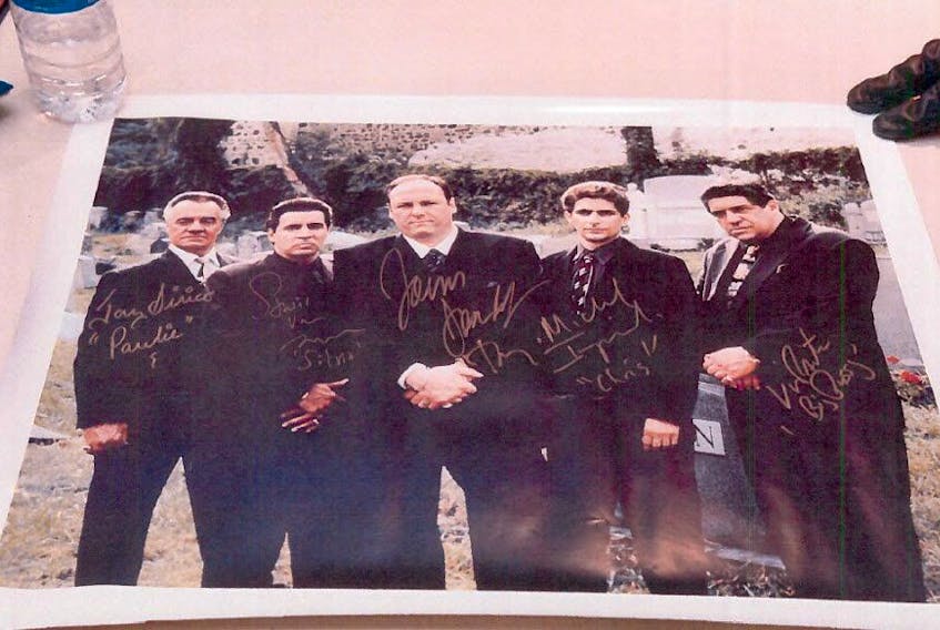  When police arrested Domenico Violi and searched his home, they found an autographed photo of the cast of The Sopranos, the popular Mafia television series.