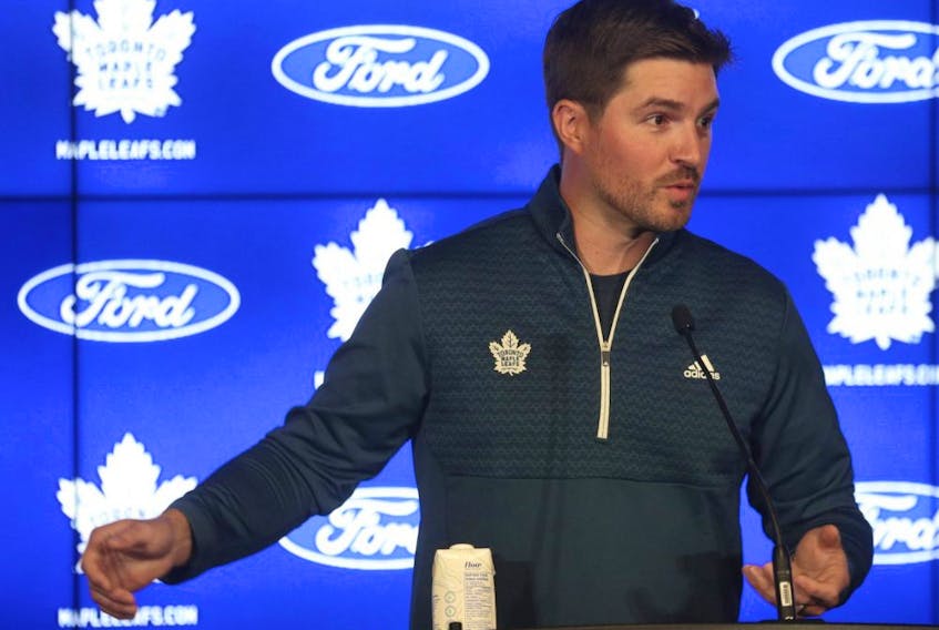 Toronto Maple Leafs general manager Kyle Dubas addresses the media on Sept. 22, 2021.