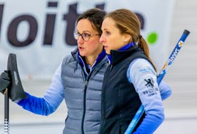 Third stone Erin Carmody, right, and skip Jill Brothers discuss strategy during the 2019 Nova Scotia women's curling championship in Dartmouth. Team Brothers is competing this week in the Canadian Curling Pre-Trials Direct-Entry Event in Ottawa, Ont. Carmody grew up in Summerside and is a product of the junior curling program at the Silver Fox Entertainment Complex. 