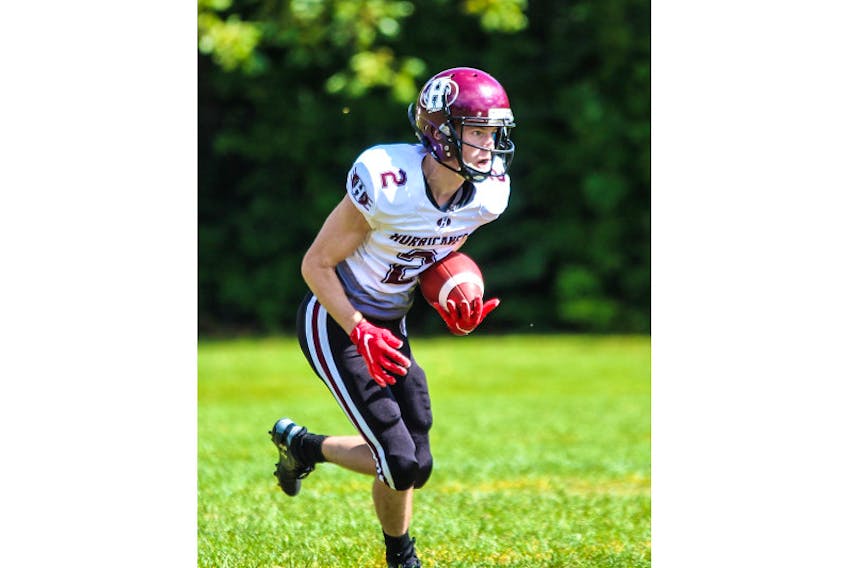 Brian Fitzgerald of the Holland Hurricanes carries the ball during an Atlantic Football League regular season game on Sept. 19 in Fredericton against the University of New Brunswick Red Bombers. The Hurricanes lost 43-8.