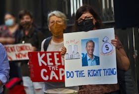 FOR CAMPBELL STORY:
Demonstrators taking part in a rent cap rally put on by the advocacy group, ACORN,  are seen during their day-long rally to maintain the cap on rental increases, in front of Province House in Halifax Thursday September 23, 2021.

TIM KROCHAK PHOTO