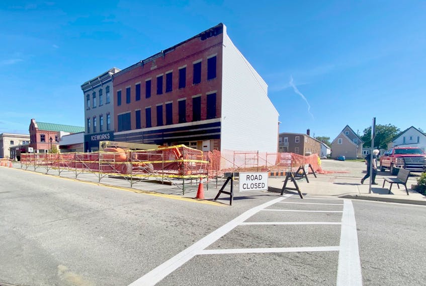 The property at 305-309 Main Street in Yarmouth – the red brick building pictured here – is being town down over ongoing safety concerns. TINA COMEAU PHOTO
