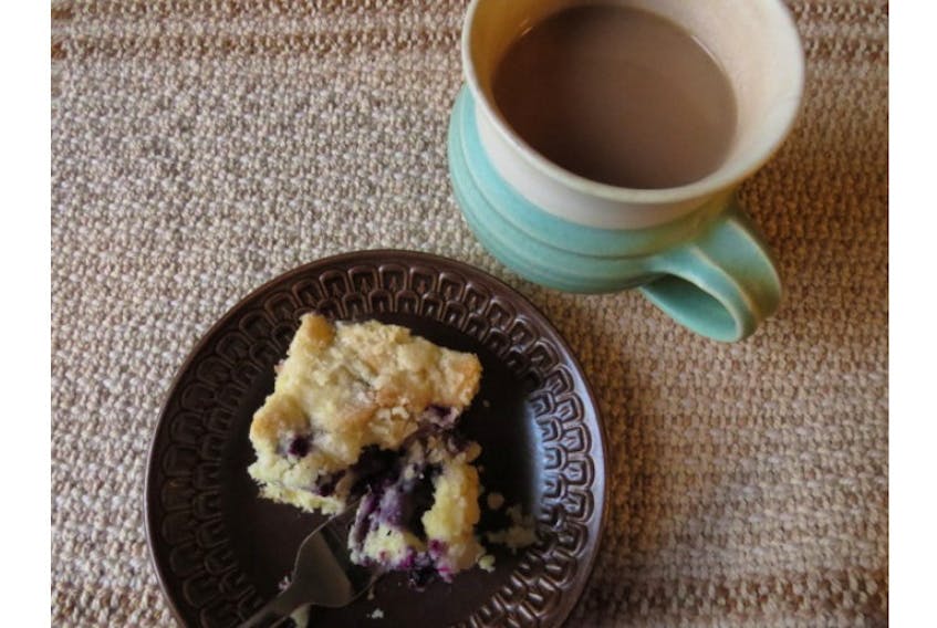 Enjoy a break with a cup of coffee and a piece of Blueberry Coffee Cake.