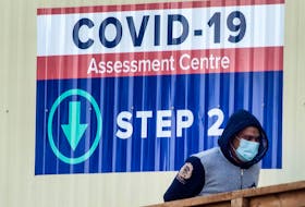  People enter a COVID-19 Assessment Centre in Scarborough, Ont.