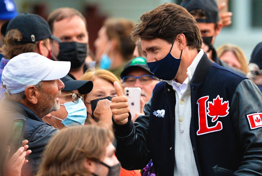 Prime Minister Justin Trudeau greets supporters gathered in Quidi Vidi Village, N.L.  during a campaign stop in Newfoundland Aug. 23.
Keith Gosse • SaltWire Network