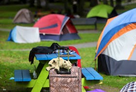 FOR NEWS FILE:
A teddy bear sits on some luggage, outside one of the tents, housing the unhoused, in Victoria Park in Halifax Friday September 24, 2021.

TIM KROCHAK PHOTO