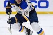  Zach Sanford #12 of the St. Louis Blues chases after the play during a 2-1 overtime win over the Los Angeles Kings at Staples Center on May 10, 2021 in Los Angeles, California.