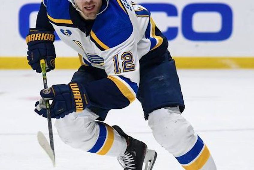 Zach Sanford #12 of the St. Louis Blues chases after the play during a 2-1 overtime win over the Los Angeles Kings at Staples Center on May 10, 2021 in Los Angeles, California.