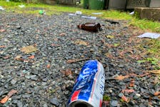 Sept. 26,2021 - Discarded beer cans and bottles still litter some properties on Larch Street on Sunday, the day after a massive street party.