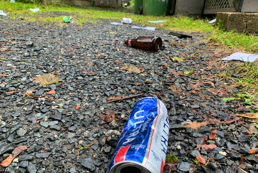 Sept. 26,2021 - Discarded beer cans and bottles still litter some properties on Larch Street on Sunday, the day after a massive street party.