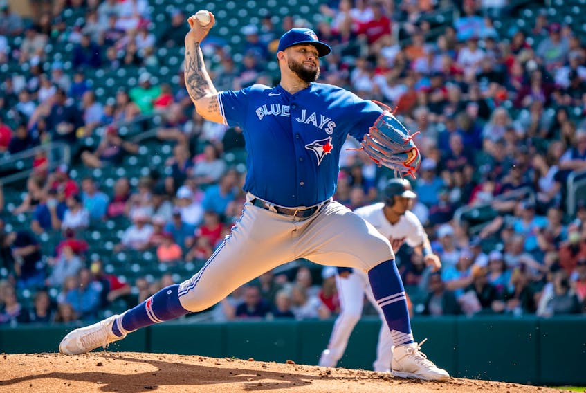 Blue Jays starting pitcher Alek Manoah delivers a pitch against the Twins at Target Field on Sunday, Sept. 26, 2021. 