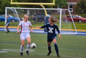 Holly O'Neill (left) and the Memorial Sea-Hawks are solidly in a playoff position in AUS women's soccer after a 2-0 win over the St. FX X-Women on Sunday. — Kendra Vigneau/St. FX Athletics