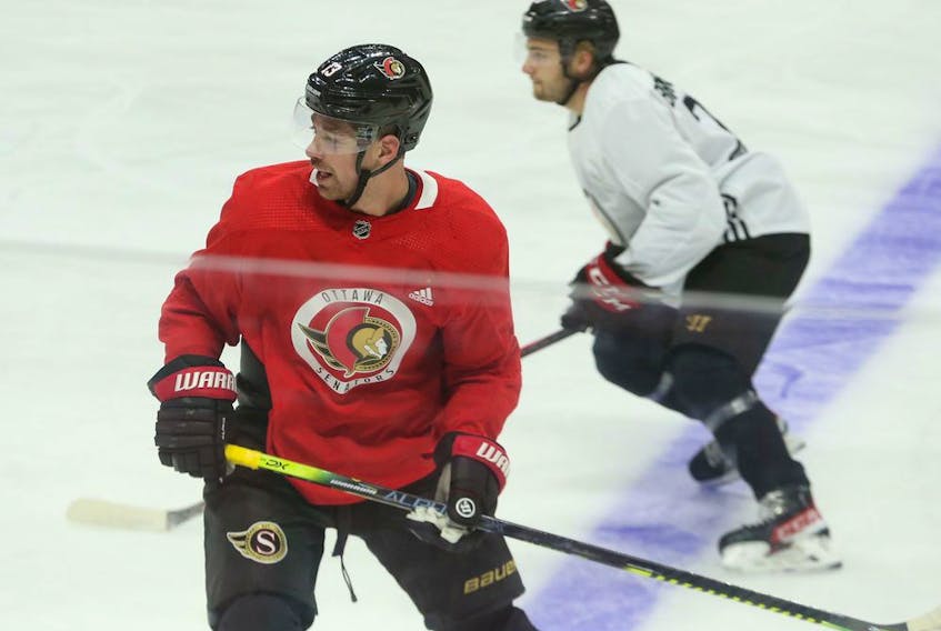 Newly acquired Zach Sanford (red) of the Ottawa Senators during morning practice at Canadian Tire Centre on Tuesday, Sept. 28, 2021.