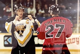 Cape Breton Screaming Eagles defenceman Trevor Ettinger, left, is shown in a heavyweight tilt with Martin Grenier of the Quebec Remparts during Quebec Major Junior Hockey League action at Centre 200 in the late 1990s. Ettinger was an Eagles fan favourite who died by suicide in July 2003. As part of the Cape Breton Post’s coverage of the Eagles’ 25th anniversary season, we pay tribute to No. 36 and the impact he left on the organization and community.