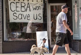 A store in Toronto displays a sign saying 'CEBA Won’t Help Us' during the COVID-19 pandemic. A recent Equifax Canada survey found that most small business owners do not feel supported by their banks and government.

