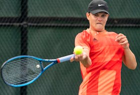 Aiden Drover-Mattinen, shown at the national boys under-16 championships in Milton, Ont., earlier this month, won in both singles and doubles on the opening day of the Junior Davis Cup in Antalya, Turkey. — Contributed