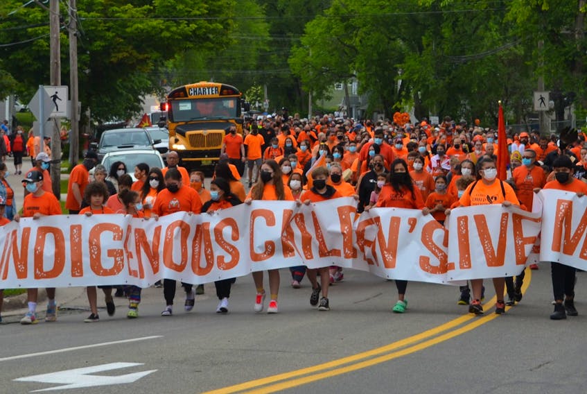 Hundreds of people gathered in Sydney on Canada Day for a march to honour residential school survivors and victims. People will again commemorate survivors and victims of the residential school system on Thursday, the first annual National Day for Truth and Reconciliation. ARDELLE REYNOLDS • CAPE BRETON POST