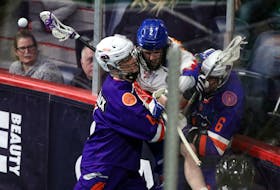 Halifax Thunderbirds defender Graeme Hossack hits Zack Manns of the Toronto Rock into the boards during a National Lacrosse League game on Feb. 21, 2020 at Scotiabank Centre. - ERIC WYNNE / The Chronicle Herald
