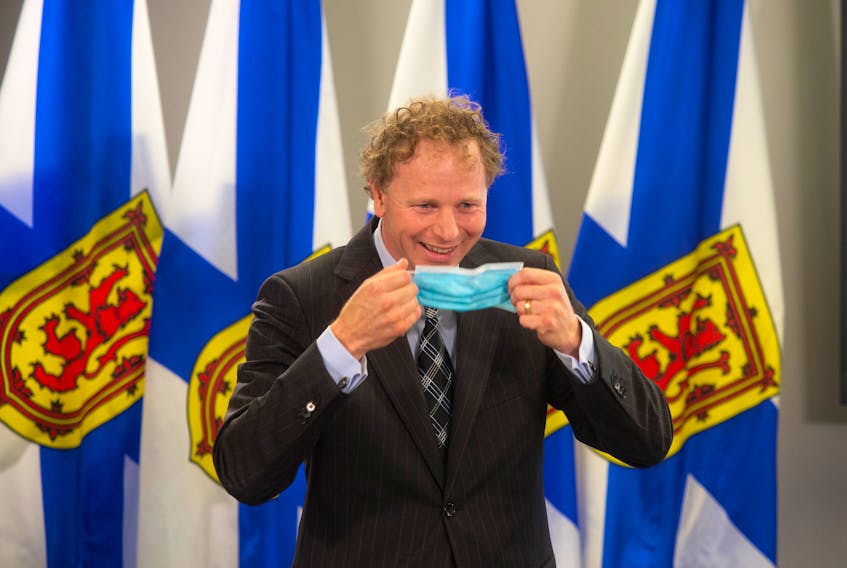 Finance Minister Allan MacMaster laughs after being asked a question about Jennifer Aniston moving to Cape Breton following a budget update at One Government Place on Wednesday, Sept. 29, 2021.
Ryan Taplin - The Chronicle Herald