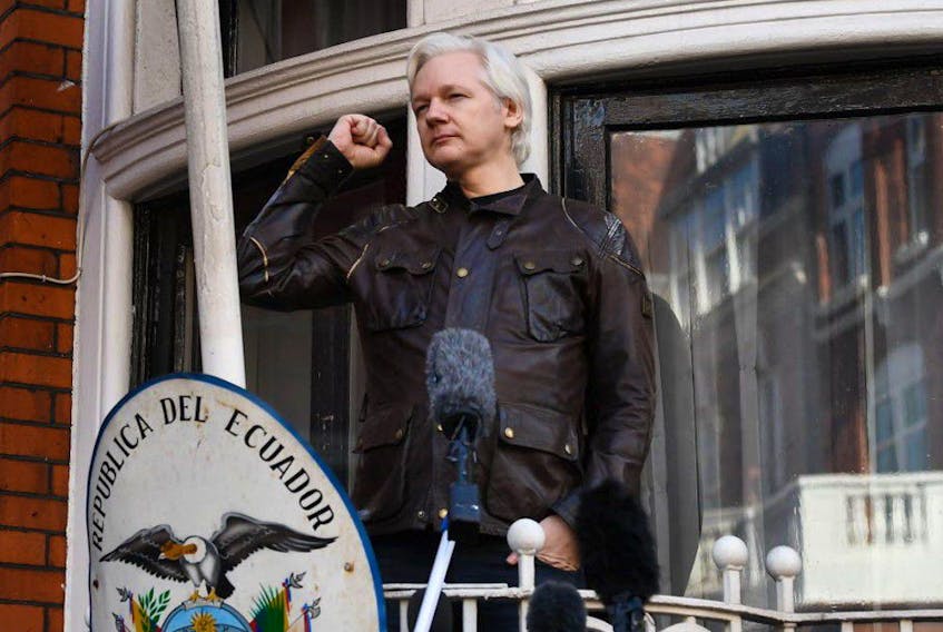  In this file photo taken on May 19, 2017 Wikileaks founder Julian Assange speaks on the balcony of the Embassy of Ecuador in London.
