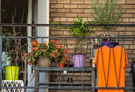 An orange t-shirt hangs on a balcony in Toronto in preparation for the first National Day for Truth and Reconciliation on Thursday, Sept. 30. (Peter J Thompson/National Post)
