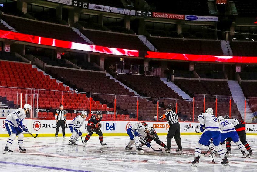  The opening faceoff between the Ottawa Senators and the Toronto Maple Leafs at Canadian Tire Centre, March 15, 2021.