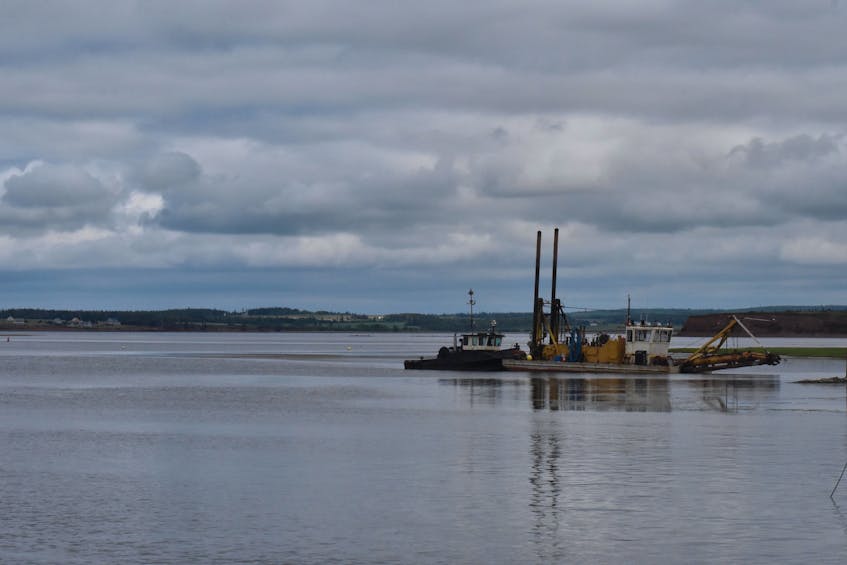 The dredge hired to clear the channel into Malpeque Harbour can barely keep up with the moving sand in 2020. - Saltwire network