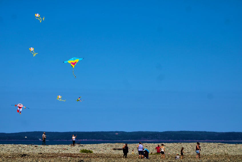 On Aug. 15, Acadians and non-Acadians met at the Acadian Cemetery at Major’s Point in Clare to remember history, families and for the first time to fly Acadian kites.