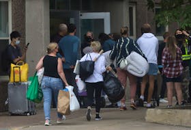FOR NEWS STANDALONE:
Parents assist their children, as they move into the Ridley Hall residence as they prepare for the school year at Dalhousie University in Halifax Friday September 3, 2021. 

TIM KROCHAK PHOTO