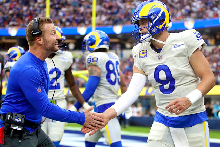 QB Matt Stafford,being congratulated by head coach Sean McVay after a third- quarter touchdown  against the Tampa Bay Buccaneers on September 26, 2021, is one reason why the L.A. Rams top our first Power Rankings. 