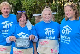 Habitat for Humanity Pictou County Chapter hosted its first Family Fun night on Sept. 23 at the Highland Drive-In Theatre. From the left, board members and volunteers Jane MacMaster and Cathy Covey, with Melanie Matheson, Habitat for Humanity Nova Scotia, and volunteer and board member Lori-Anna Jenkins were ready to take donations at the gate of the drive-in from generous audience members.