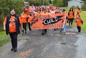 A walk was held in Millbrook First Nation on Truth and Reconciliation Day to honour residential school survivors and their families. 