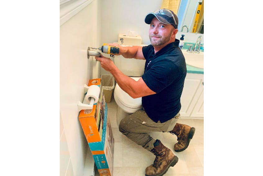 Dwane Whelan leads a team of Stella’s Circle social enterprise training participants who install home supports to help seniors age in place through Home To Stay. - Photo courtesy Stella’s Circle.