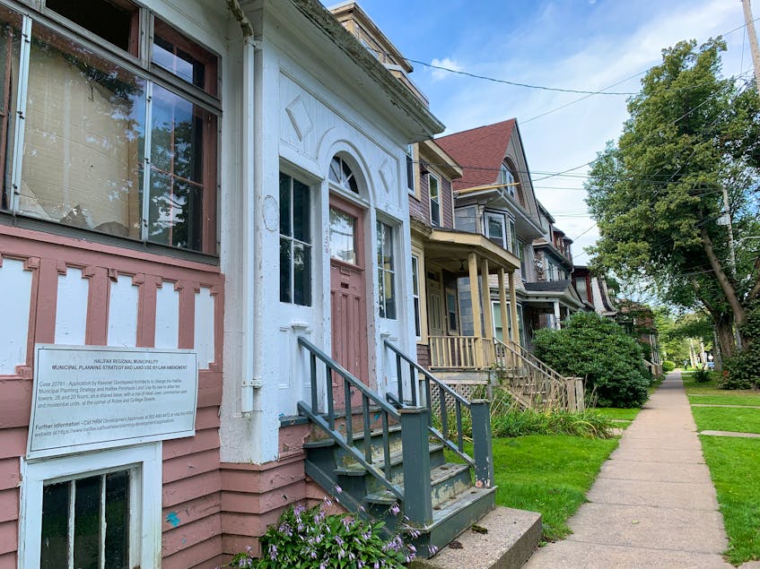 Historic homes along Carlton Street are slated to be torn down to make way for a pair of two-tower development projects. - Stuart Peddle