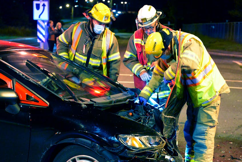 One man was hospitalized following a two-vehicle crash on the Prince Philip Parkway Monday night. Keith Gosse/The Telegram