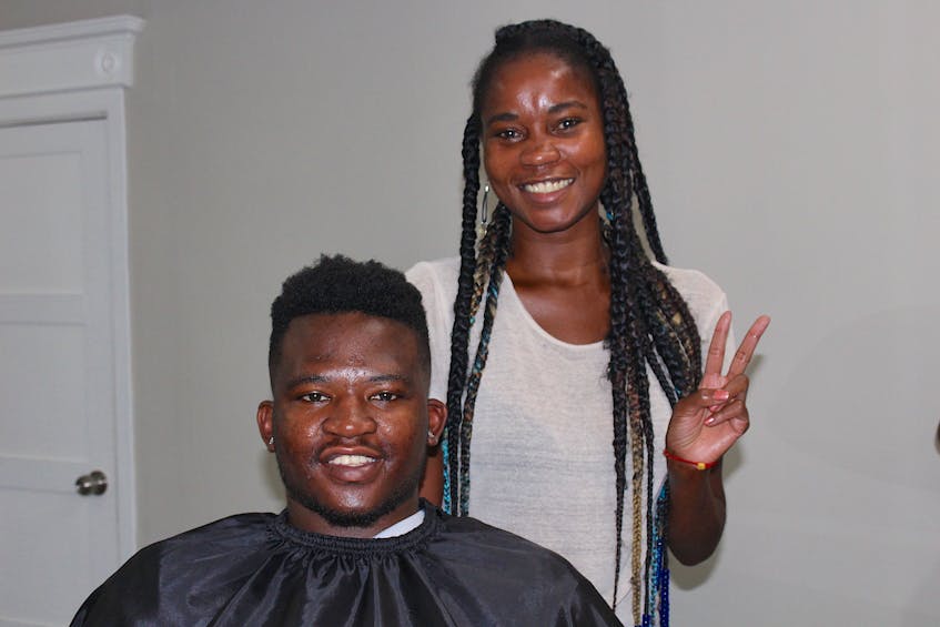 Mudiwa Makanza (left) is a regular at Joana Smits' Braids&Fades on Cashin Avenue in St. John's, which opened its doors in July 2020. - Andrew Waterman